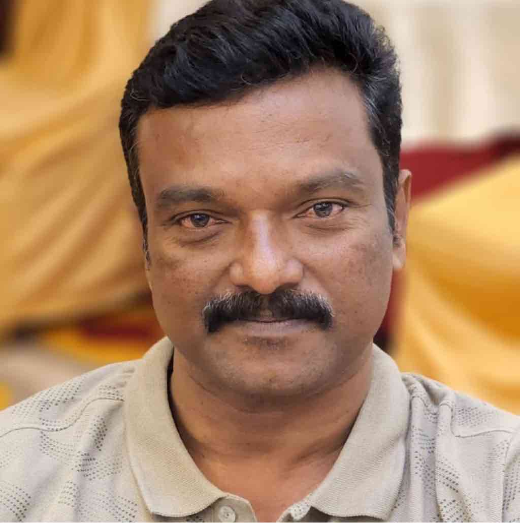 Shanmugam M
