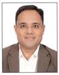 Tushar D Shah