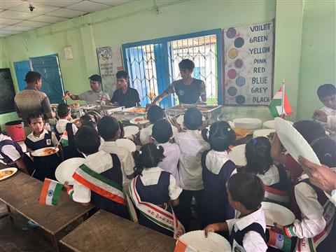 Serving Food To underprivileged Student