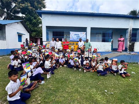 Distribution of notebooks to Bihari School student