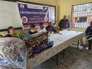 Distribution Of Blankets by Green Land Members