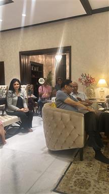 Meeting with charity auction