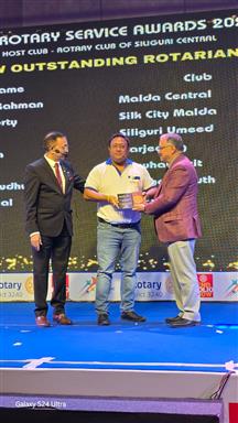 THE ROTARY SERVICE AWARD
