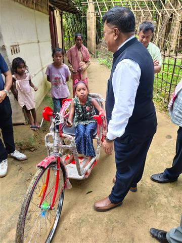 Tricycle donation to physically challenged student