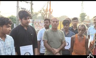 Cloth distribution to needy family for durga puja