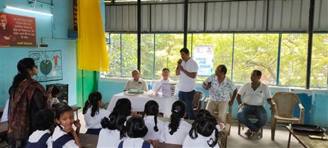 Distribution of notebooks and pencils