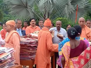 Distribution of Saari to the needy at R K Mission