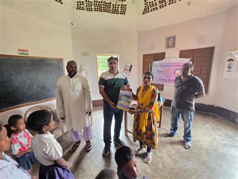 Slate and Slippers Distribution in Thakuganj