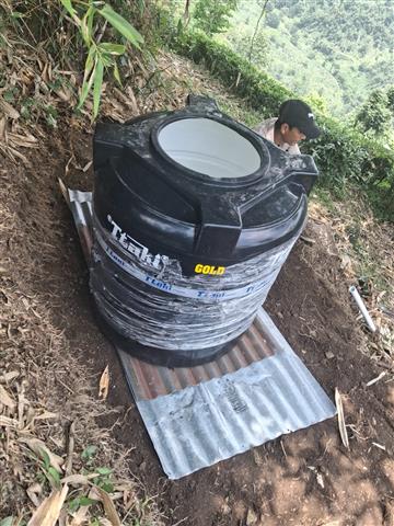 Overhead water tank and pipeline construction.
