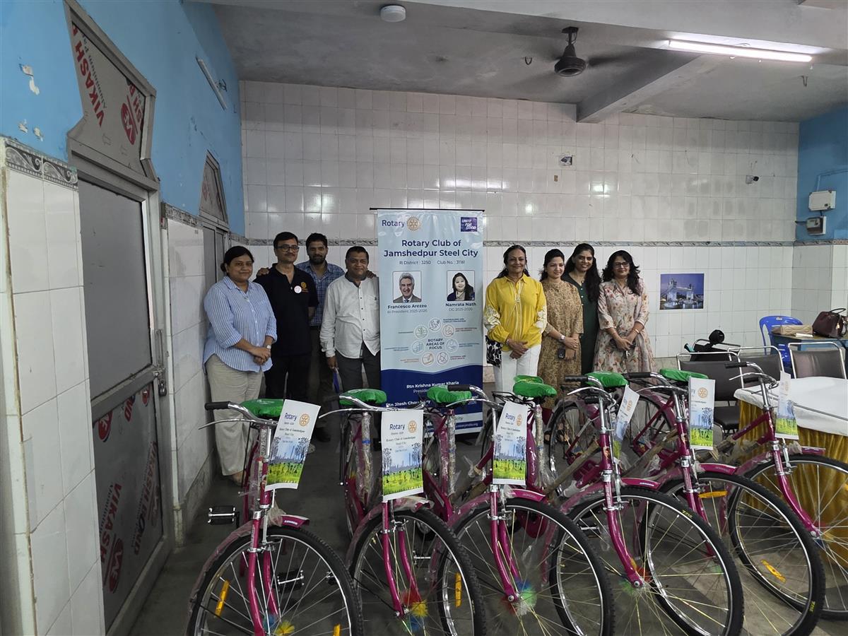PINK CYCLES AND HELMET DISTRIBUTION