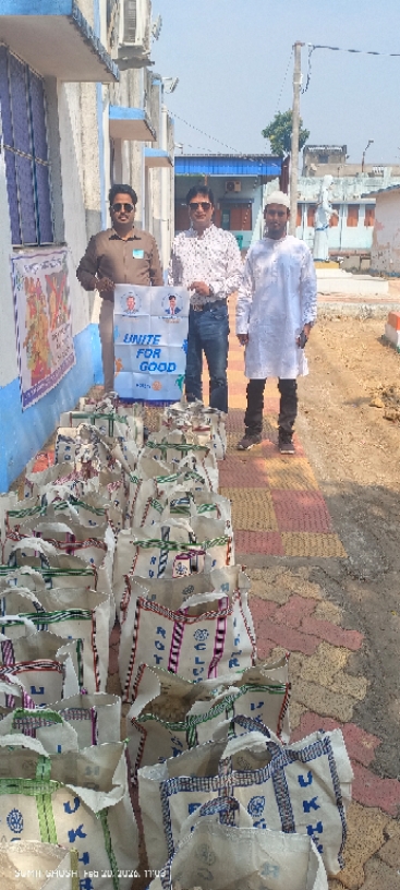 Food packets being distributed to the T.B. Patient