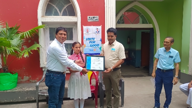 Interact Club Certificate being handed over.