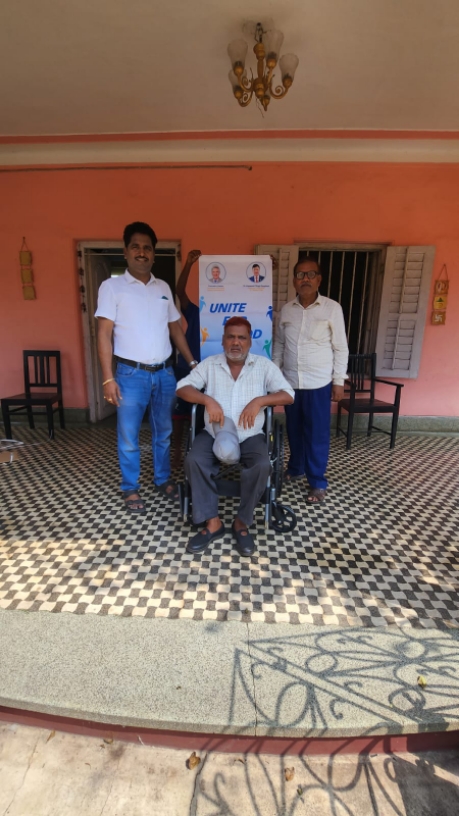 Wheel chair Distribution to a needy.