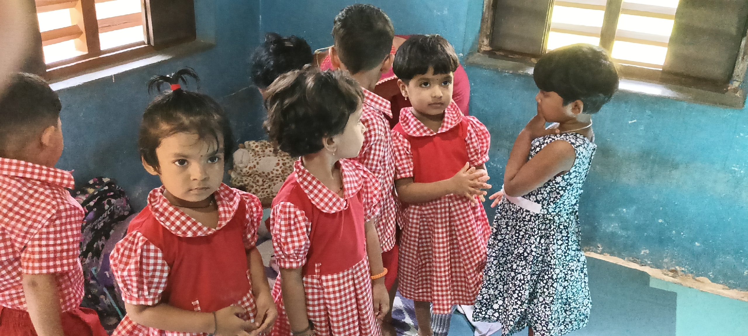 Providing cupboard and mat to anganwadi