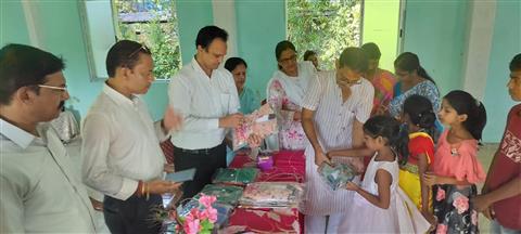 DISTRIBUTION OF NEW CLOTHS TO STUDENTS.