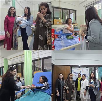 Donation of new born clothes and fresh fruits