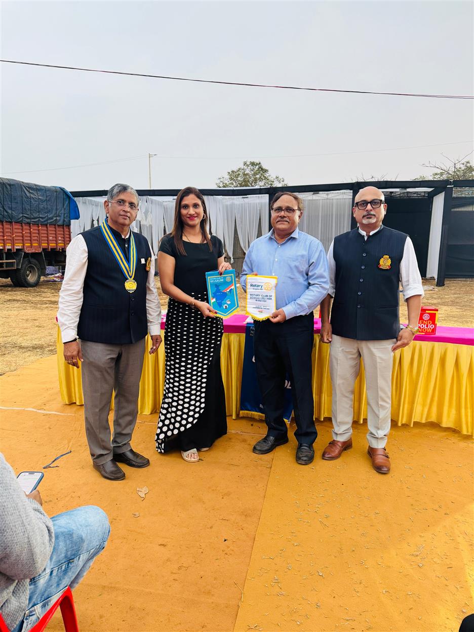 Flag exchange with the prestigious Rotary Belgaum