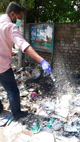 Limestone sprinkling on garbage