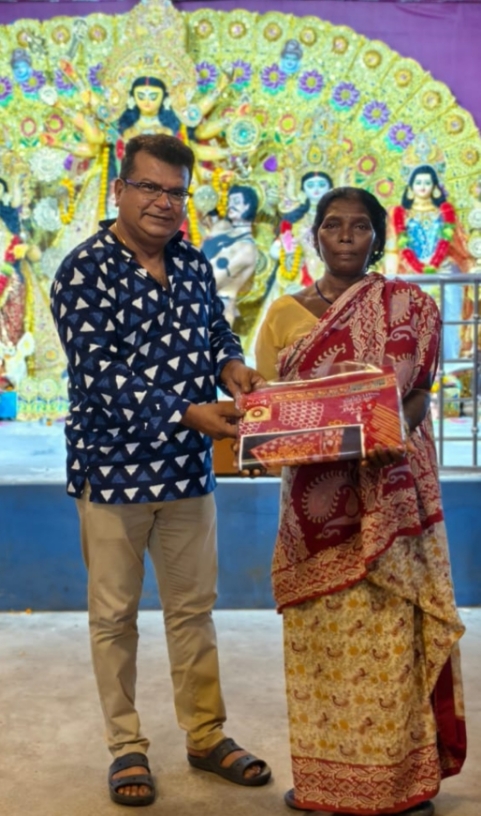 Saree distribution on Durga Puja occasion 