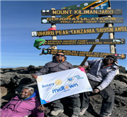 Flag Unfurling on Mount Kilimanjaro