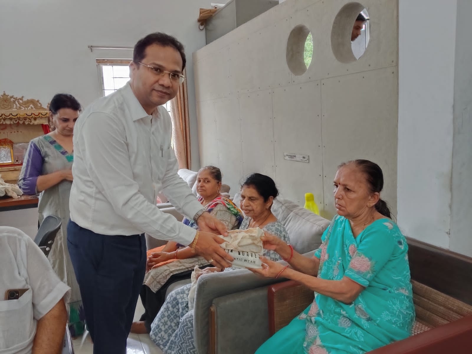 old age home visit and serving food
