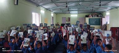 Distribution of Notebooks, Umbrellas-Tribal School