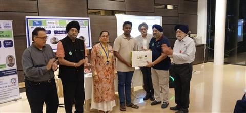 Donation of laptop to a needy student