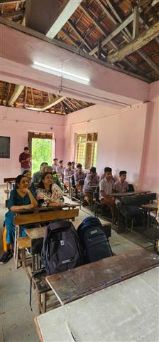 Donation of Notebooks, Laptop tables & Pencils