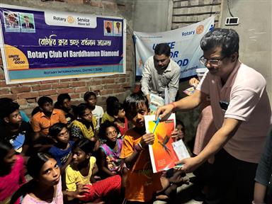 Distribution of Copies to 75 needy students