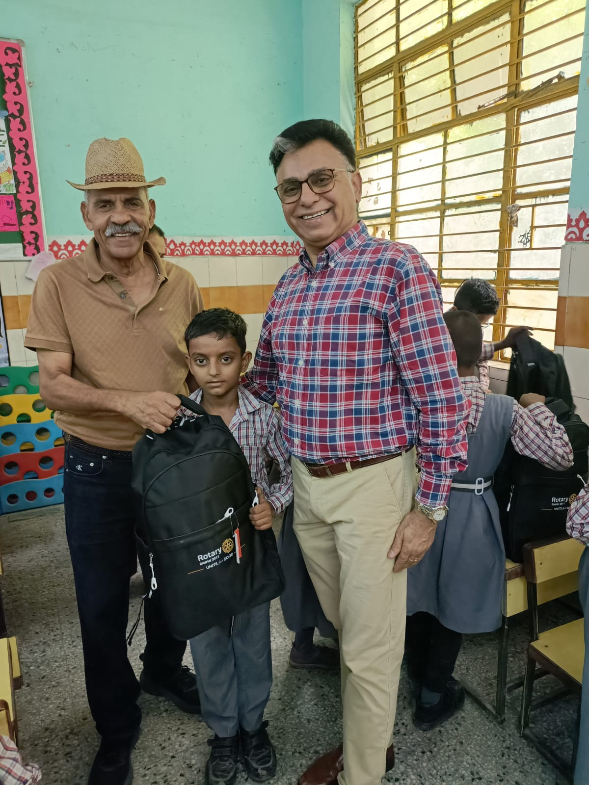 SCHOOL BAG & KIT DISTRIBUTION TO YOUNG STUDENTS